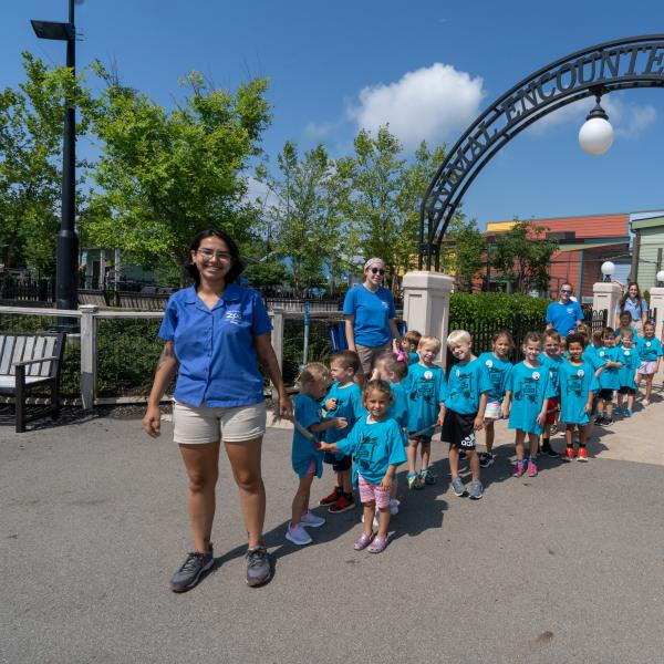 ZooKids instructor leading group around the zoo